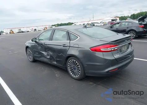2018 Ford Fusion Hybrid Titanium z USA, uszkodzony, nr VIN 3FA6P0RUXJR124344